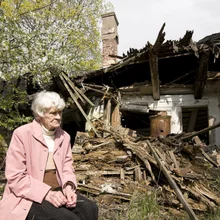 old woman destroyed house disaster insurance
